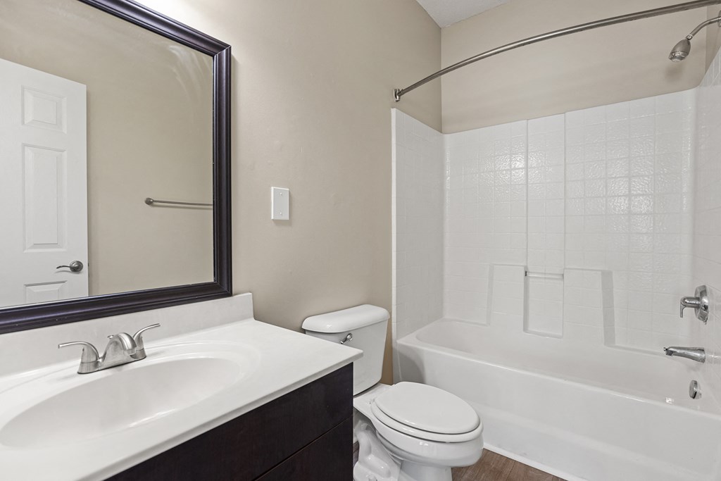 the preserve at ballantyne commons apartment bathroom with sink toilet and shower