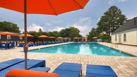 our apartments have a resort style pool and lounge chairs