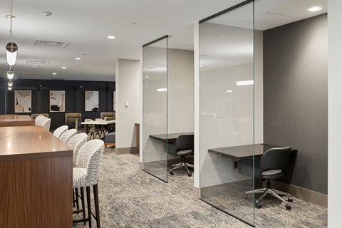 a conference room with white walls and glass doors at Preston Centre, Ohio