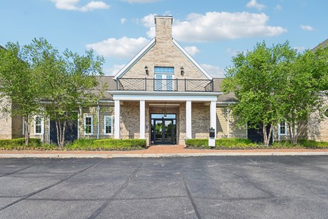 A building with a brick facade and a large entrance.
