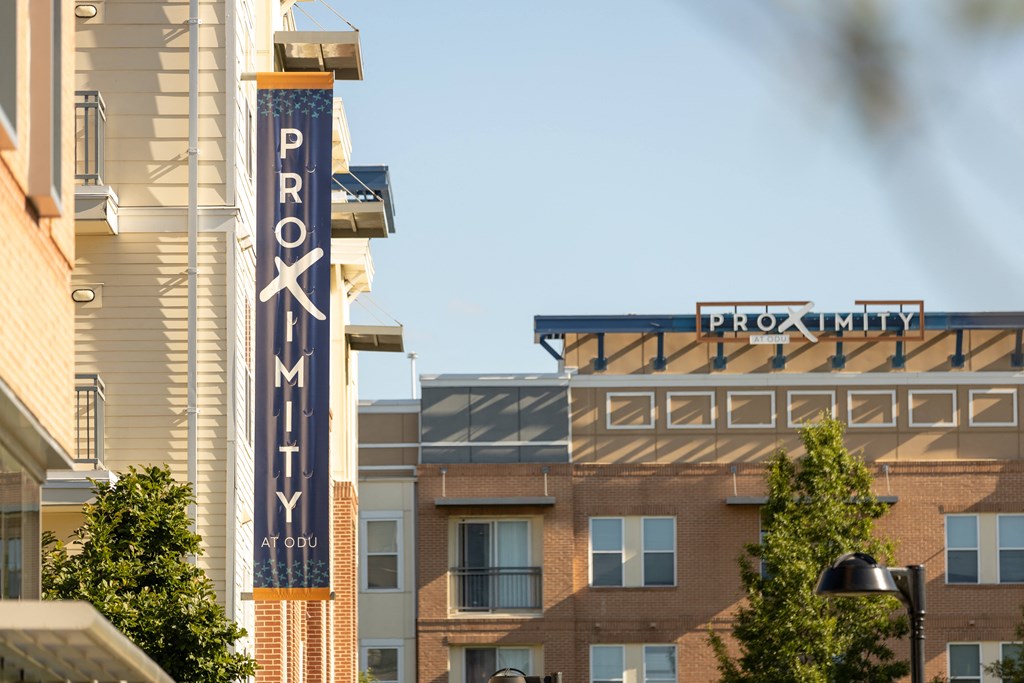 a view of a building with a sign for providence commons