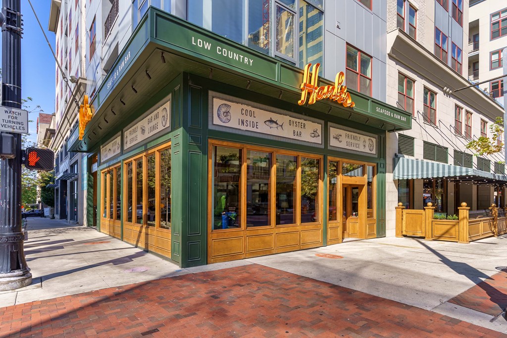 A restaurant named Hatt's on a city street corner at The Madison in Columbus, OH 