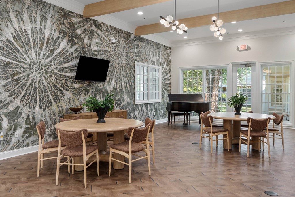 Multipurpose room with piano and seating at The Orchard, Dublin, OH, 43016