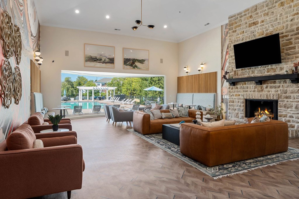 Clubroom with cozy seating, fireplace and television. at The Orchard, Dublin