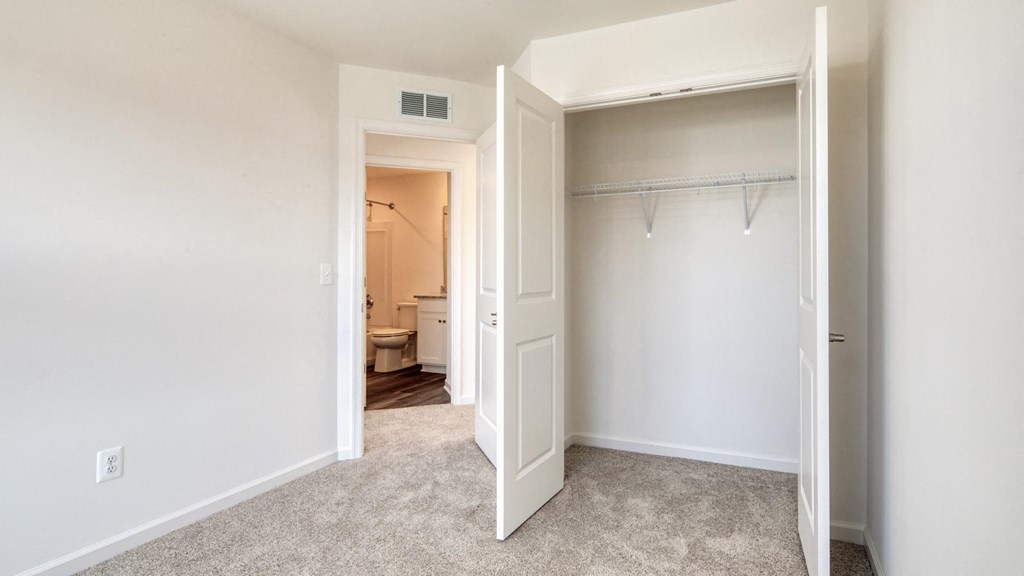 Comfortable Bedroom With Accessible Closet at The Mark Townhomes Apartments, Harrisonburg, VA, 22801