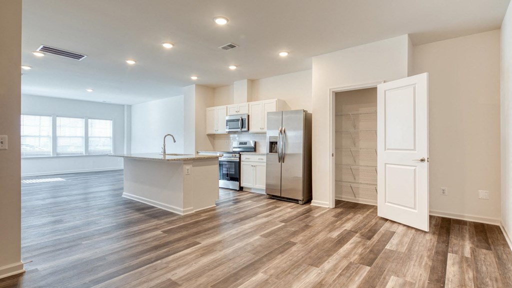 Fitted Kitchen With Island Dining at The Mark Townhomes Apartments, Harrisonburg, Virginia
