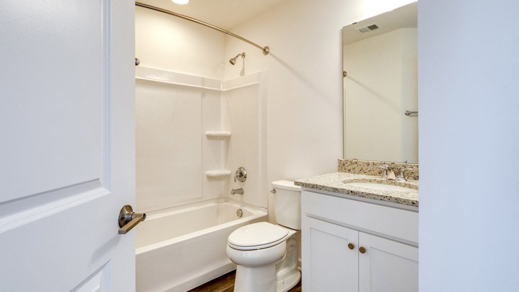 Modern Bathroom with Framed Mirror at The Mark Townhomes Apartments, Harrisonburg, VA
