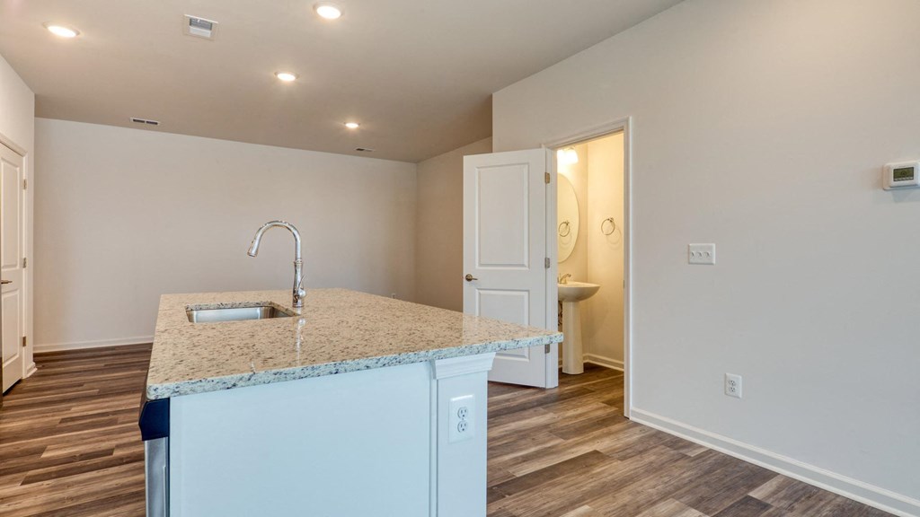 Stainless Steel Sink With Faucet In Kitchen at The Mark Townhomes Apartments, Harrisonburg, VA