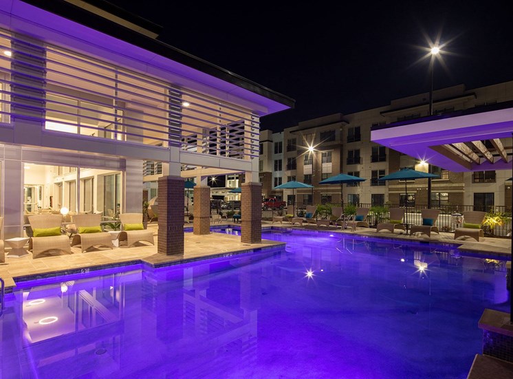 Twilight pool view at Lumen Apartments in Hampton, VA
