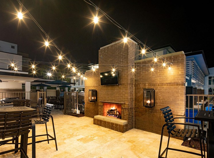Twilight outdoor lounge at Lumen Apartments in Hampton, VA
