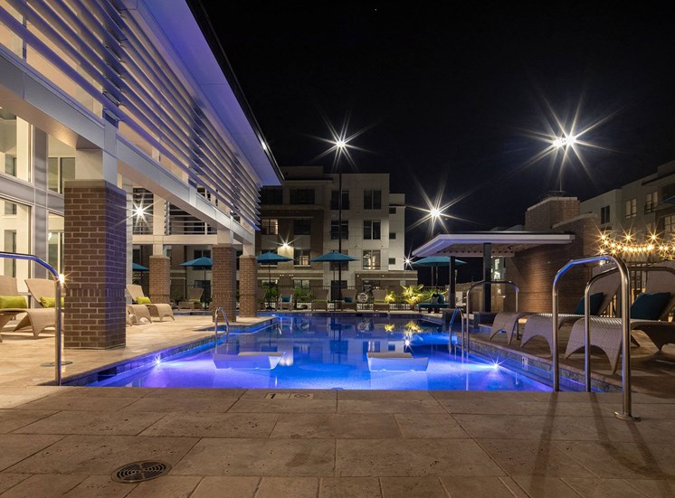 Pool at night at Lumen Apartments