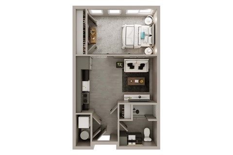 A diagram of a small apartment with a bedroom, living room, and kitchen.