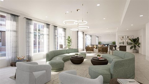a living room filled with furniture and large windows