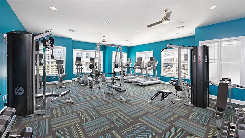 a gym with a lot of exercise equipment in itat Addison Crater Woods, Petersburg, VA 23805