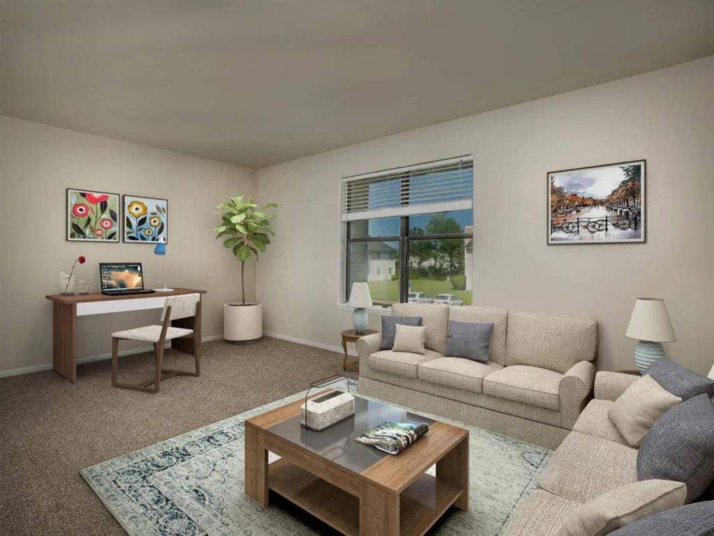 a living room with a couch and a table