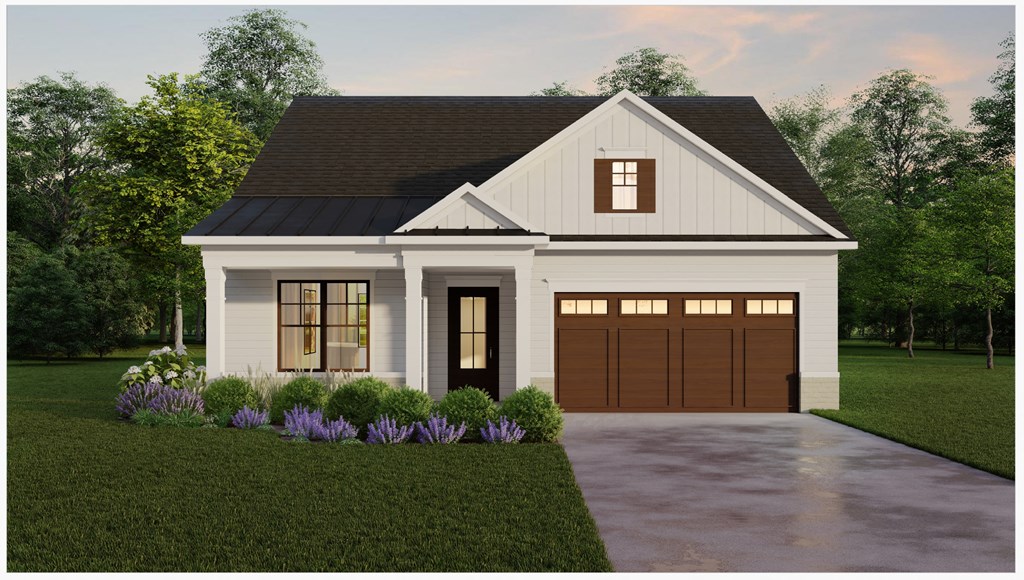 a home with a driveway and a garage door