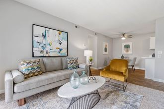 a living room with a couch and a table