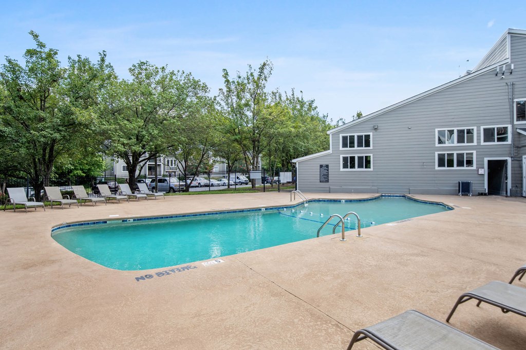 a swimming pool at the resort on a sunny dayat Village 1373, Greensboro North Carolina
