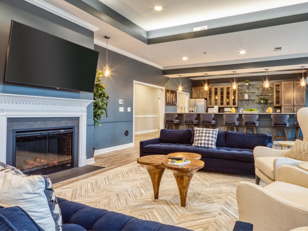 Fireplace, TV and seating at the Residents Clubhouse