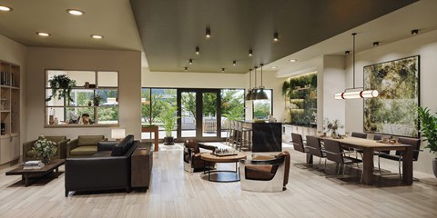 A modern living room with a variety of seating options and a large window.