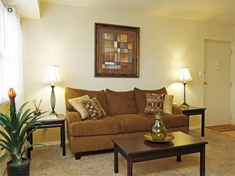 a living room with a couch and a coffee table