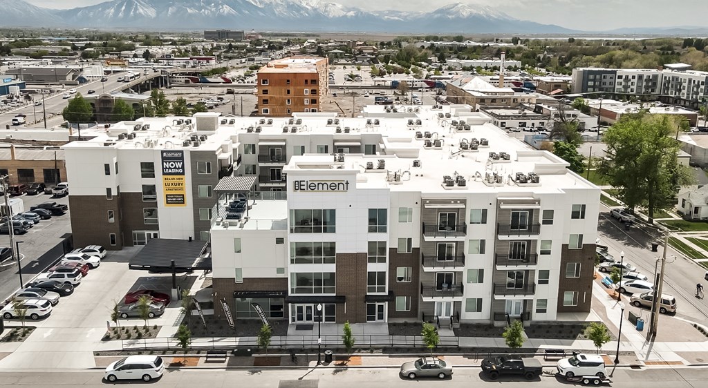 A large white building with the word Element on it.