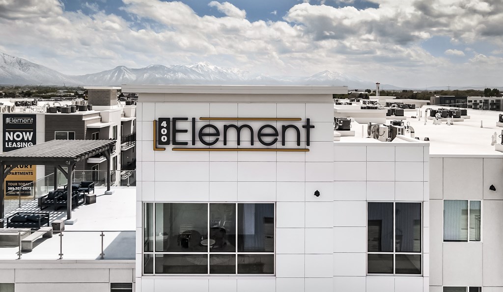 A white building with the word Element on it.