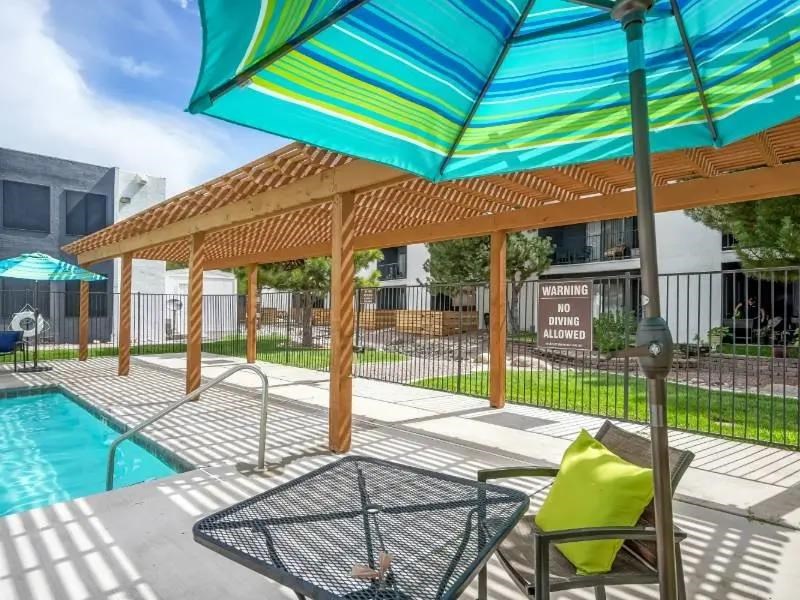 A pool area with a warning sign that says "No Diving Allowed".