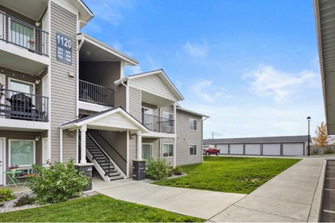 Apartment building with the number 1120 on the front at Woodland Meadows Apartments, Post Falls