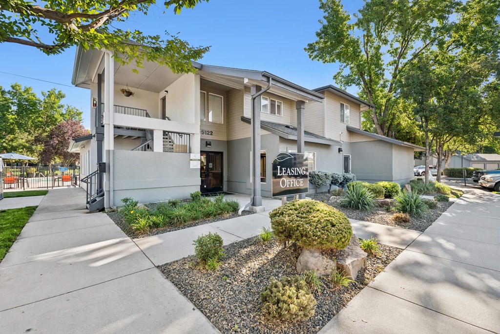 A building with the words "Leasing Office" on it.