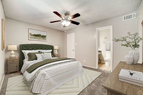 Bedroom with ensuite bathroom at Peaks at Universal City Apartments, Universal City, TX
