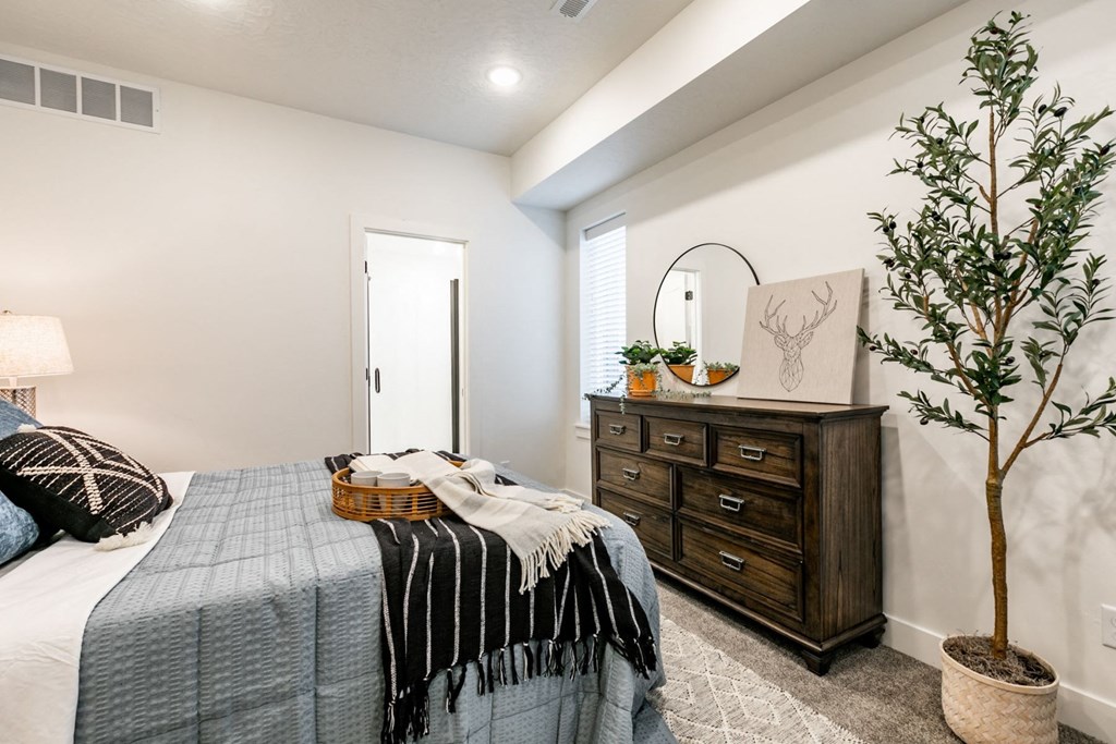 bedroom with a bed and a dresser