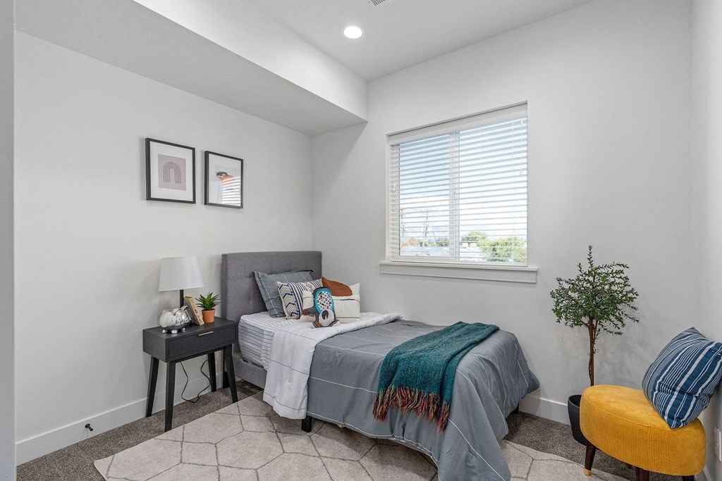 bedroom with a bed and a window