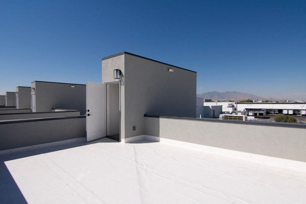 the roof of the building with the sky in the background