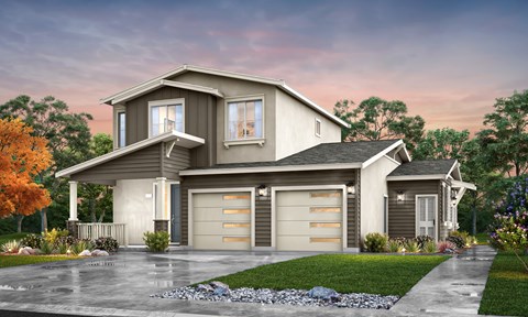 A modern two-story house with a garage and a driveway.