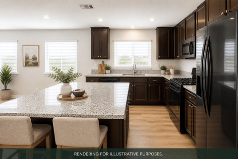 A modern kitchen with dark brown cabinets and a granite countertop.