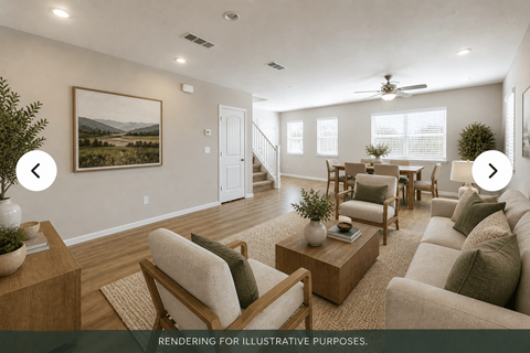 A living room with a painting on the wall and a dining area in the background.