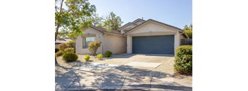 A house with a garage and a driveway.