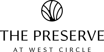A logo with a basketball and text that says "The Preserve at West Circle".
