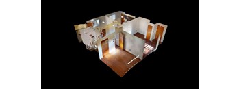 A top down view of a house with a kitchen, living room, and bedrooms.