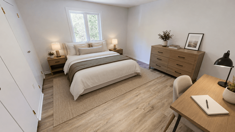 A bedroom with a bed, nightstand, and desk.