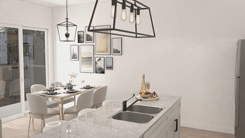 A modern kitchen with a dining table set for four.