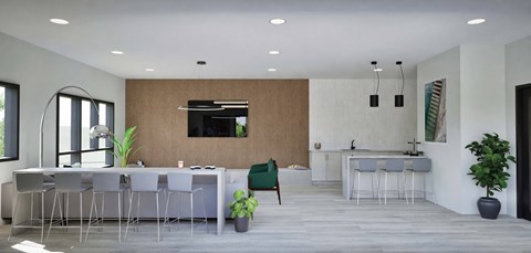 A modern kitchen with a dining table and chairs.