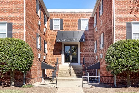 The front of a brick building with a sign that says 40th East Mornge Avenue.