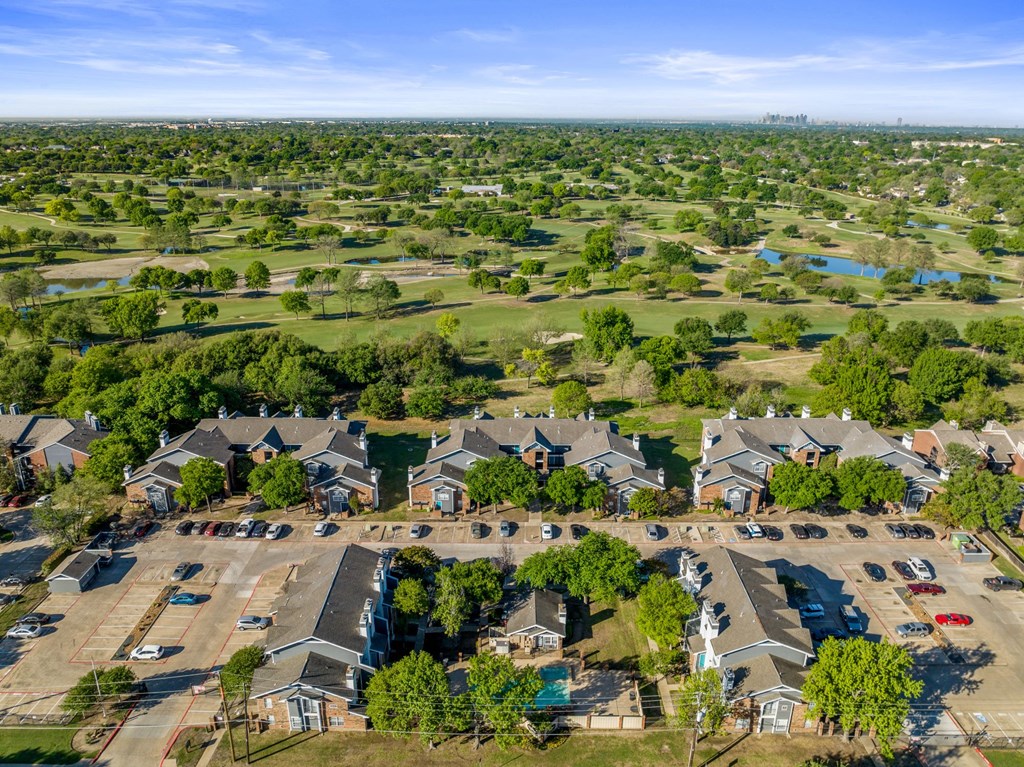 aerial shot of apartment overlooking golf course