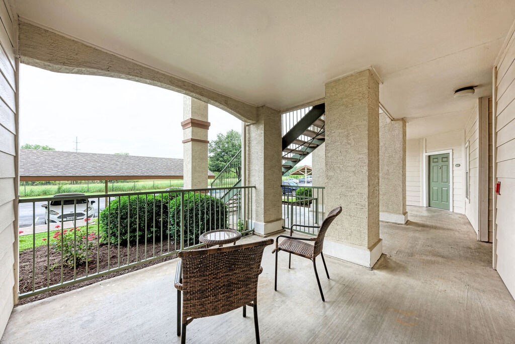 A patio with a table and chairs is shown.
