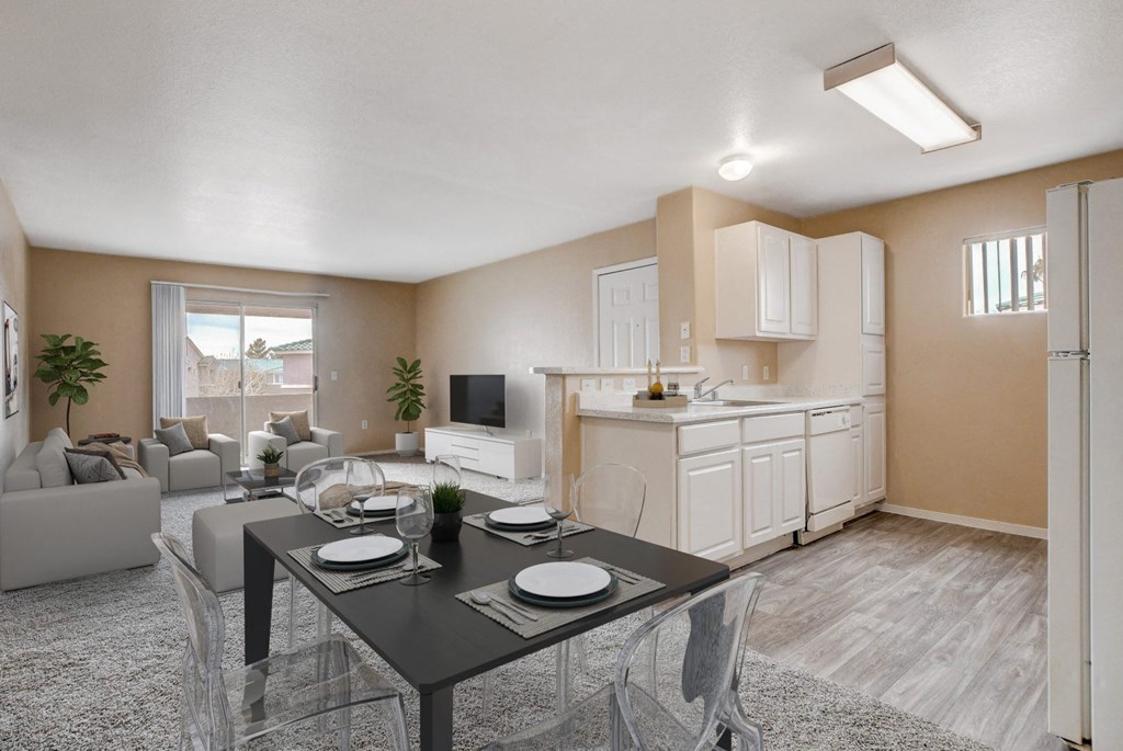 A modern dining room with a glass table and chairs.