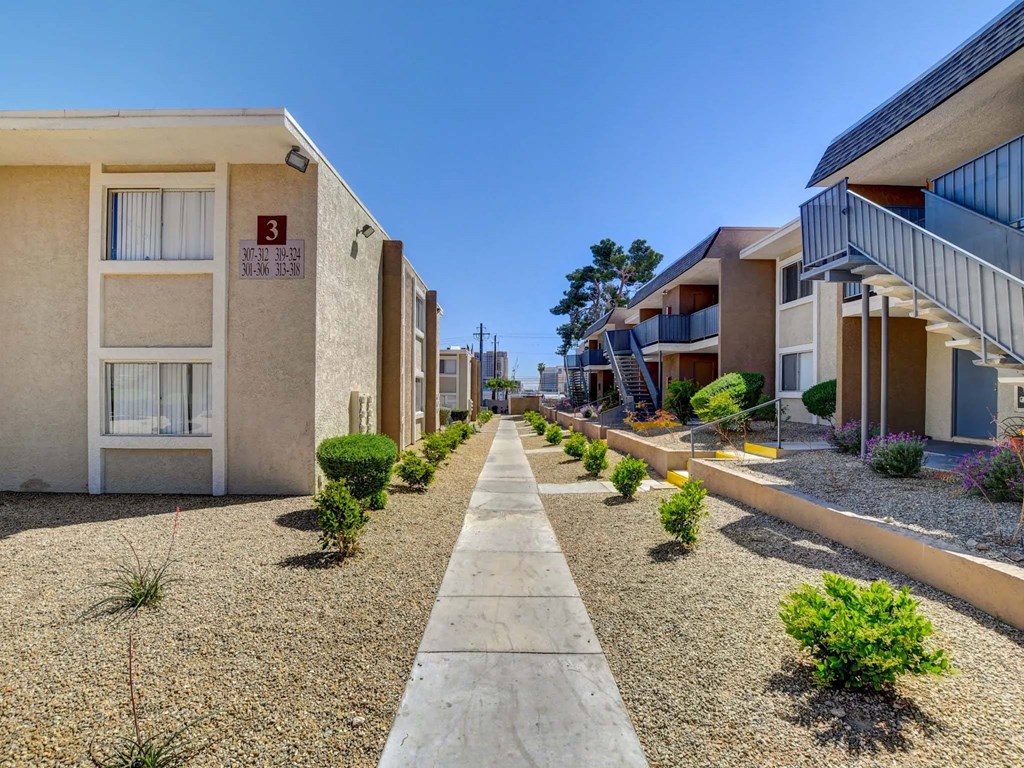 A row of houses with number 3 on the front of the first one.