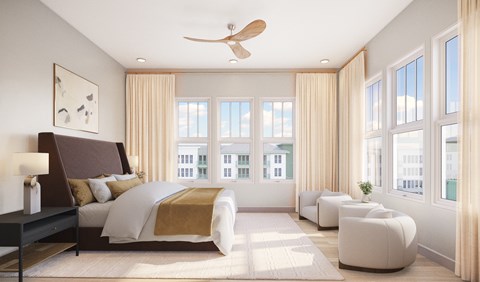 A bedroom with a large bed and a view of the city.
