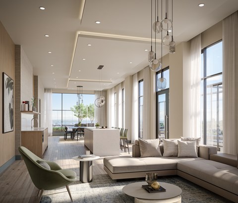 A modern living room with a green chair and a white sofa.